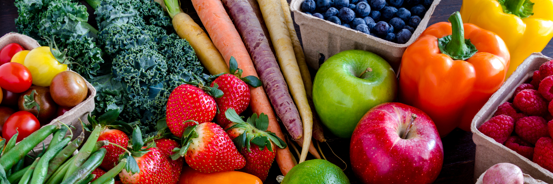 Fresh fruits and vegetables at Butcher and Farmer in Buckeye, Arizona, highlighting Double Up Food Bucks savings on produce
